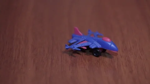Toy blue plane on a dark background made of plastic Stock Footage 71889358