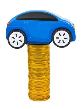 Toy car and stack of coins Toy car and stack of coins isolated on white ba... Foto stock