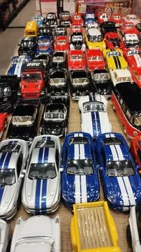 Toy Car Collection Displayed On A Table Foto stock