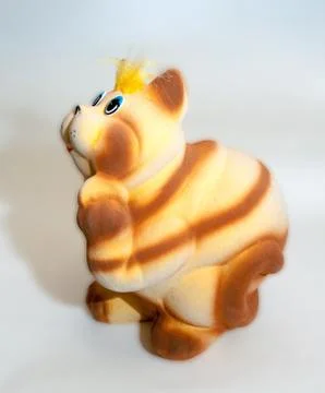 Toy cat sitting Stock Photos