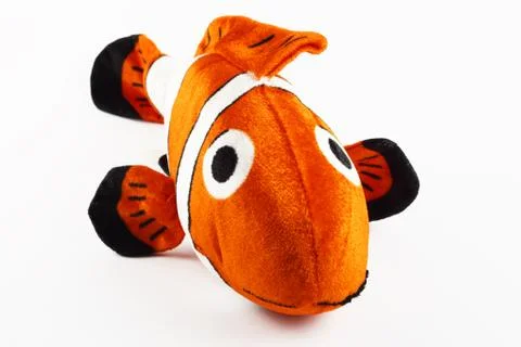 Toy clown plush fish, on a white background, isolate Foto stock