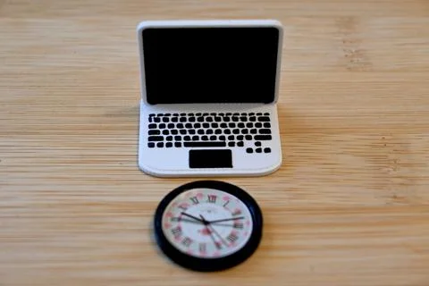 Toy computer with clock digital time concept with copy space Fotos Stock