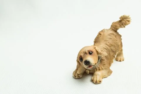 Toy dog on a light background Stock Photos
