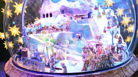 Toy electric cable car and train filled with decorations of Jungfraujoch Stock Footage 33782014