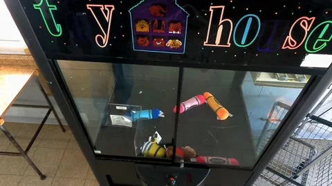 Toy 'Grab' Claw Machine Video stock 150912777