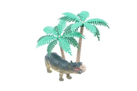 Toy Hippo with Trees Stock Photos