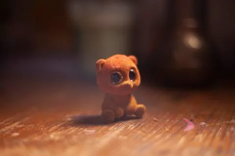 Toy little bear on the table. Stock Photos