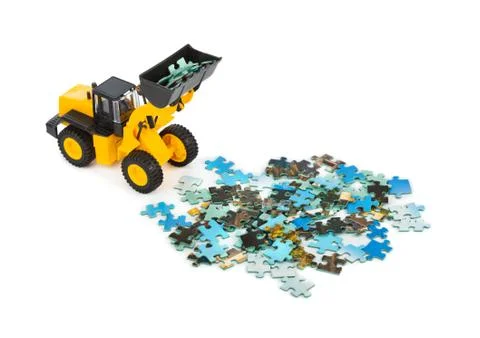 Toy loader and puzzle Stock Photos