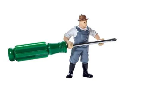 Toy man with screwdriver Stock Photos