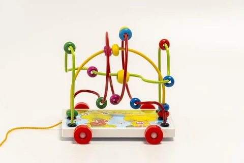 Toy maze on a white background. development of fine motor skills of hands, lo Stock Photos