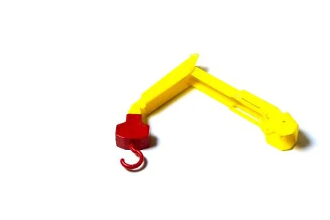 Toy mechanical crane hook function isolated figure Stock Photos