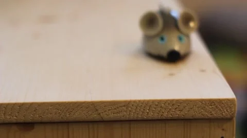A toy mice moving on a table comes and goes Stock Footage 66465336