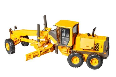 A toy model of a powerful construction road tractor with an adjustable blade  Stock Photos
