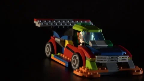 Toy moves on black Stock Footage 154426659