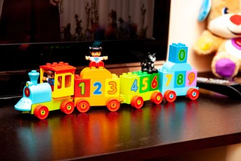 Toy multi-colored children's train with numbers Stock Photos