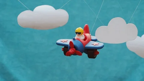 The toy plane with the pilot shakes on a grove. Stock Footage 102796009