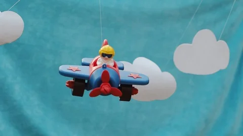 The toy plane with the pilot shakes on a grove. Stock Footage 102796116