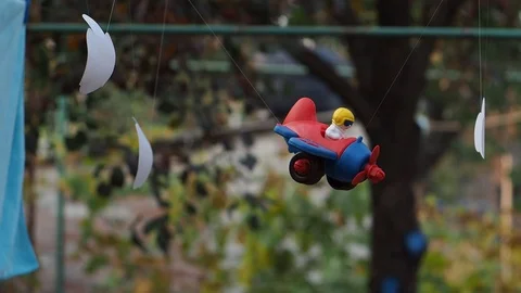 The toy plane with the pilot shakes on a grove. Stock Footage 102796168