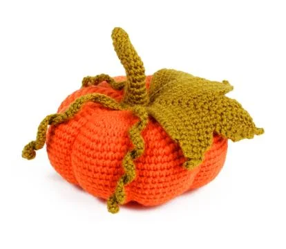 Toy pumpkin on a white background, isolate, close-up. Foto stock