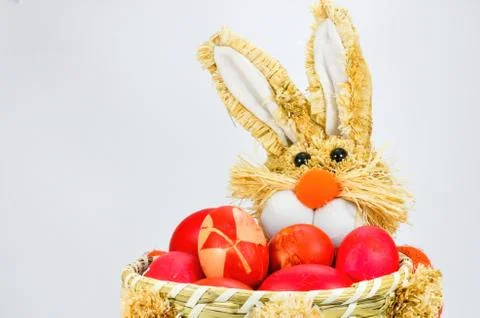 Toy rabbit with Easter eggs Stock Photos
