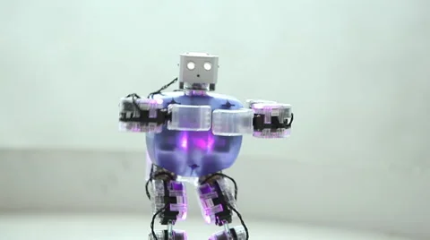 Toy robot dancing and lights Stock Footage 48835091