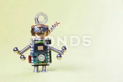 Toy robot with dumbbells. Strength training concept. Circuits socket chip Stock Photos