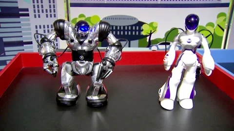 Toy robots for children dancing on the podium Stock Footage 101846286