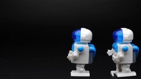 Toy robots walking. Stock Footage 186602627