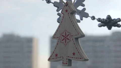 Toy snowflakes waving in the wind, a cold day. conveys an exciting mood. Stock Footage 82644926