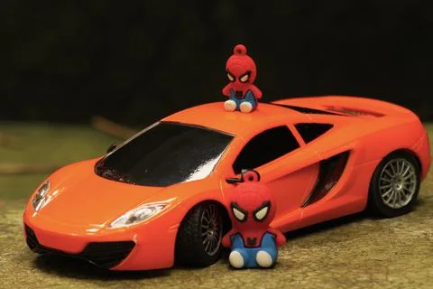 Toy spiderman and Spiderman Jr Stock Photos