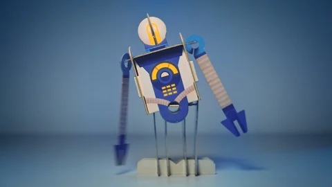 Toy spring-loaded robot moves up to the end of the charge. Spring sound Stock-Footage 119311645