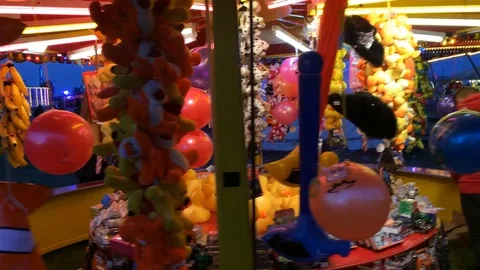 Toy stall at the evening Funfair Stock Footage 93867035