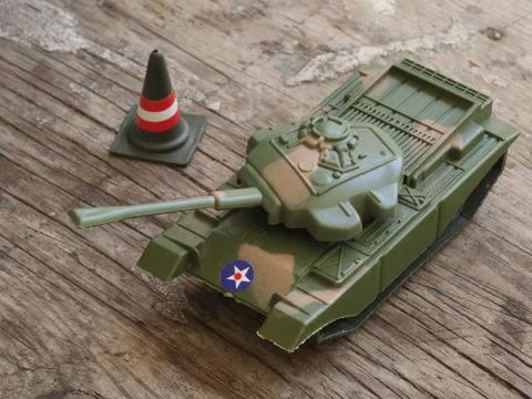The toy tank is on the table Stock Photos