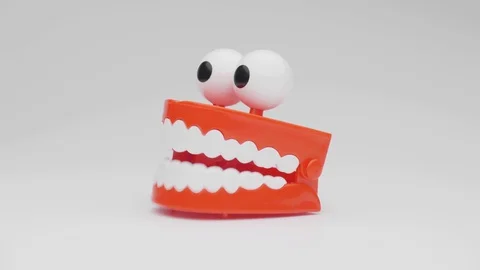 Toy teeth. Moving funny tooth model toy. Stock Footage 128578257