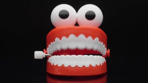 Toy teeth. Moving funny tooth model toy. Stock-Footage 128609708