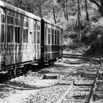 Toy Train moving on mountain slope, beautiful view, one side mountain, one si 스톡 사진