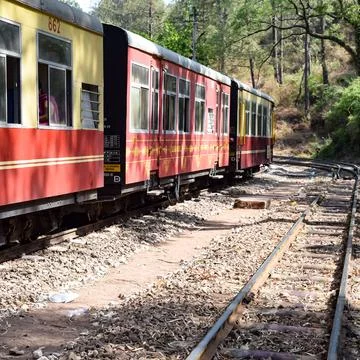 Toy Train moving on mountain slopes, beautiful view, one side mountain, one s Foto stock