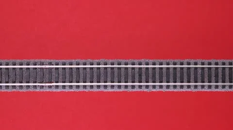 Toy train passing on red holiday background Video stock 12363903