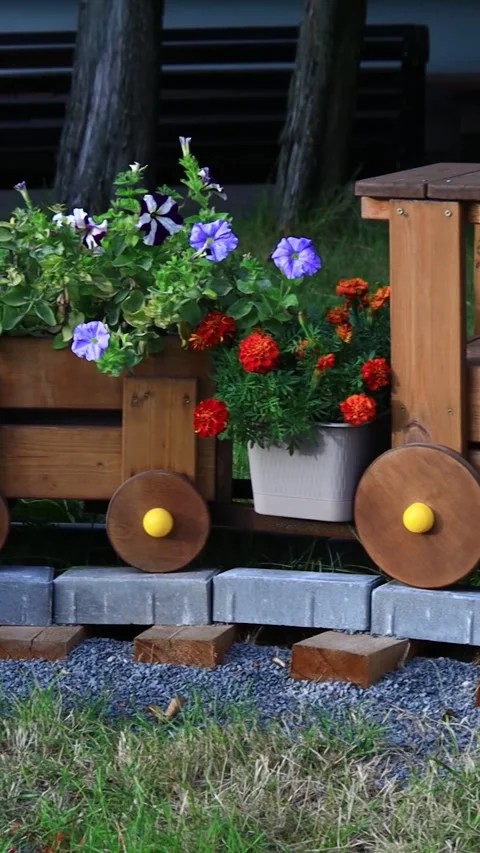 Toy train with planter on top, perfect for decorative use or as a gift Stock Footage 344158918