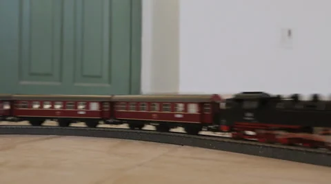 Toy train riding from the side Stock Footage 37557673