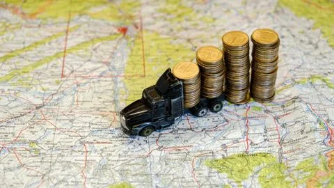 Toy truck full of coins. Financial news, Bank loans, Finance and money saving Stock Photos