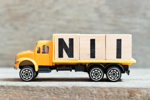 Toy truck hold alphabet letter block in word NII (Abbreviation of Net interes Stock Photos