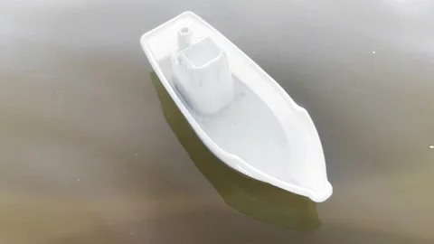 Toy white ship on beach Stock Footage 282670031