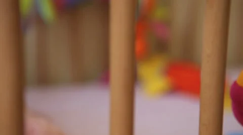 Toys in the baby's cot Vídeo Stock 41751359