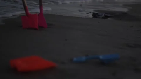 Toys on the beach at Dusk Stock Footage 271095679