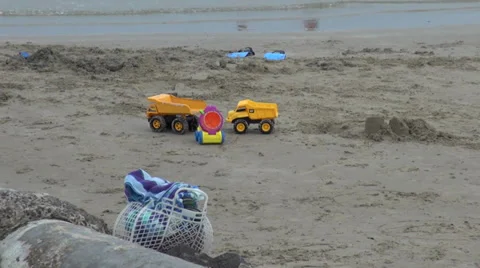 Toys on beach Stock Footage 36044230