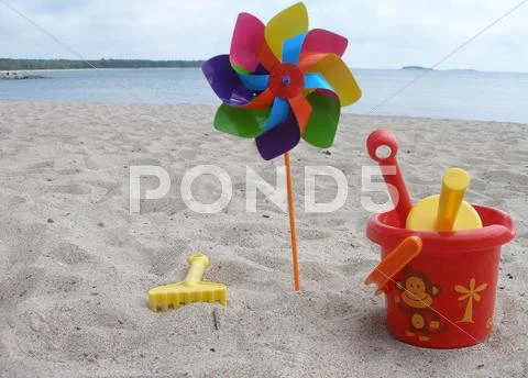 Toys on a beach Stock Photos