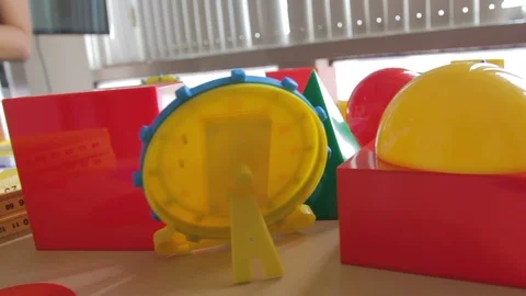 Toys being setup in the table Stock Footage 87625629