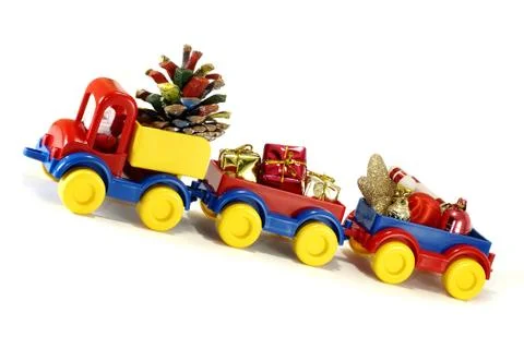 Toys, car-truck and Santa Claus with gift Stock Photos