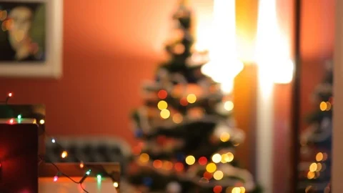Toys on the Christmas tree in the background of a wet window. Illuminations. Stock Footage